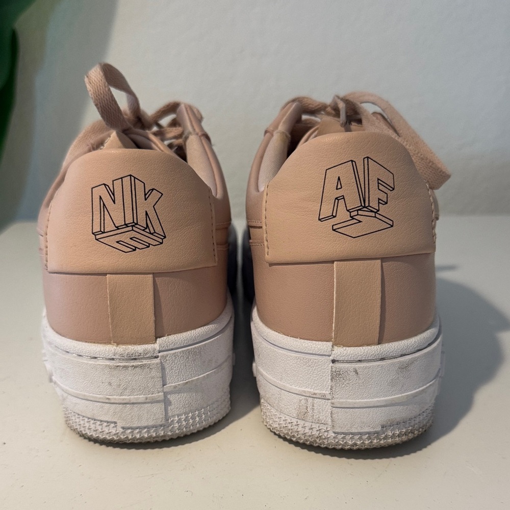 Nike Sneakers in Light Pink and White